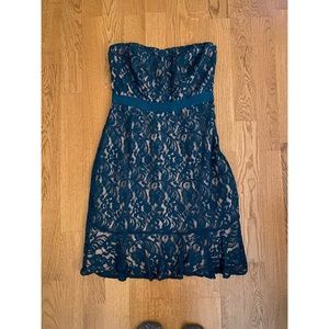 The limited strapless lace dress